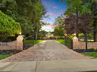 Luxurious Tudor-Style Estate on Manicured Grounds