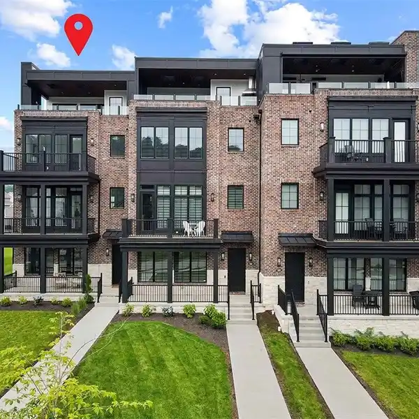 DISTINCTIVE BROWNSTONE AT THE RIVER'S EDGE