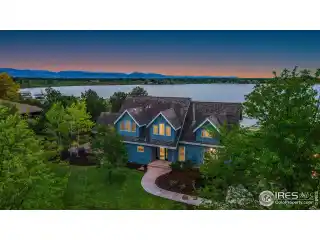 Serene Lakefront Living with Spacious Patio