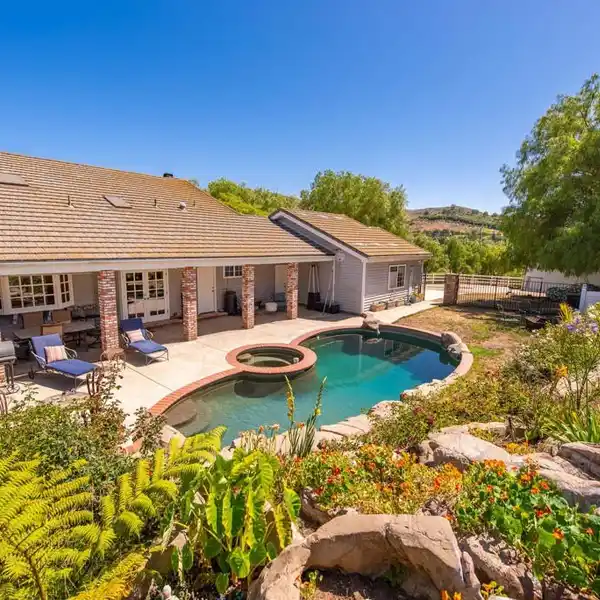 LOVELY SINGLE-STORY HOME ON FIVE ACRES