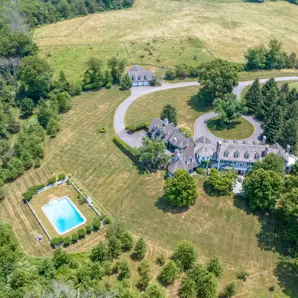 EXQUISITE COLONIAL REVIVAL ESTATE ON 43 ACRES