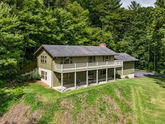 STUNNING RANCH STYLE HOME OFFERING YEAR ROUND VIEWS