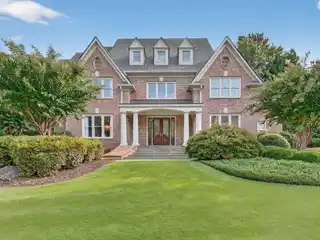 Resort-Style Living in Gated Riverfront Retreat