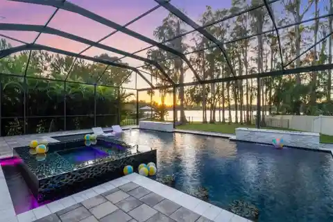 Lakefront Luxury with Resort-Style Pool and Sunset Views