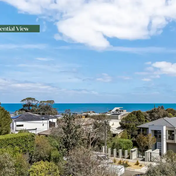 BEACHSIDE CLASSIC WITH BAY GLIMPSES AND ENDLESS POTENTIAL