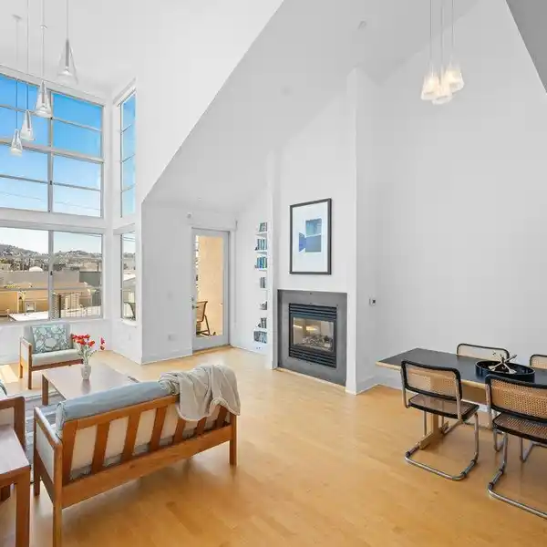 EXPANSIVE TRI-LEVEL LOFT CONDOMINIUM