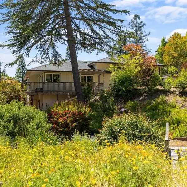 EXTENSIVELY UPDATED HOME IN A PEACEFUL SETTING