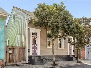 Masterfully Reimagined Creole Cottage with Chic Guest Quarters