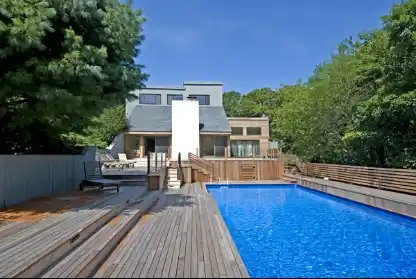NEWLY REMODELED HOME WITH MULTI-LEVEL SUN DECK AND POOL