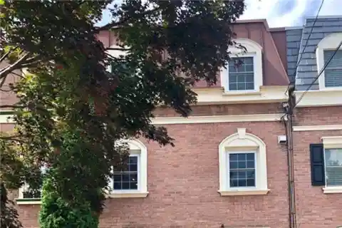 Tree-lined Elegance Steps from Campus Life