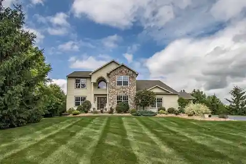 Grand Colonial Retreat on Lush Cul-De-Sac
