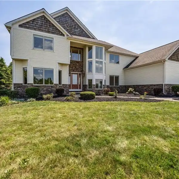 BEAUTIFULLY CONSTRUCTED HOME WITH ENDLESS FEATURES