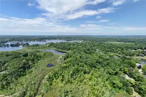 13.5-Acre Wooded Sanctuary on Commerce Lake