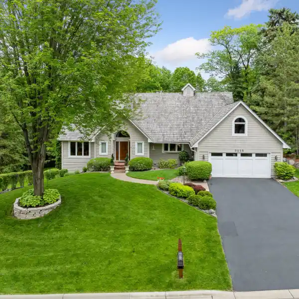 METICULOUSLY MAINTAINED WAYZATA HOME ON A SERENE, PRIVATE LOT