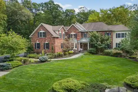 Stately Brick Colonial in Chadeayne Woods