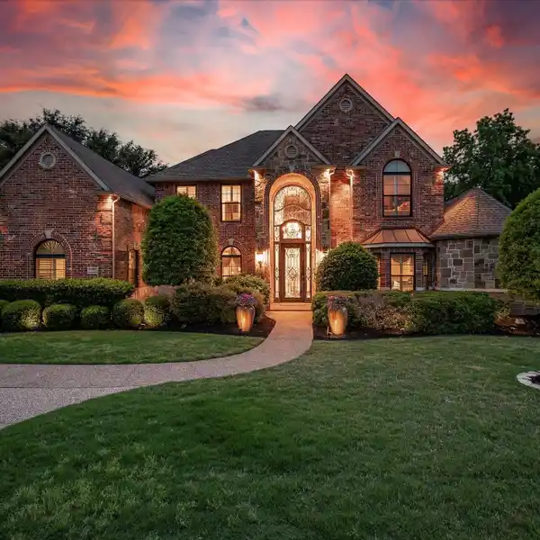 A HOME BEYOND COMPARE IN COVETED SOUTHLAKE WOODS