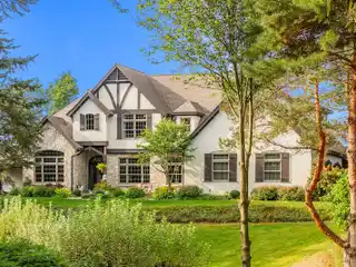 European-Style Home on Eight Wooded Acres