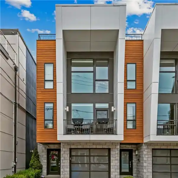 ENTERTAIN IN STYLE WITH TWO ROOFTOP DECKS