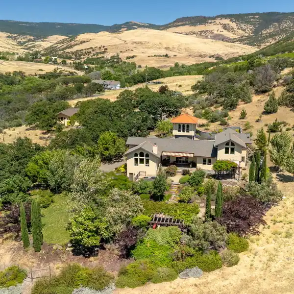 TWO HOMES ON OVER TEN ACRES