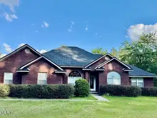 Meticulously Maintained Single-Story Brick Home on 20 Acres
