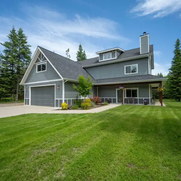 GRAND HOME WITH WRAPAROUND PORCH AND WORKSHOP