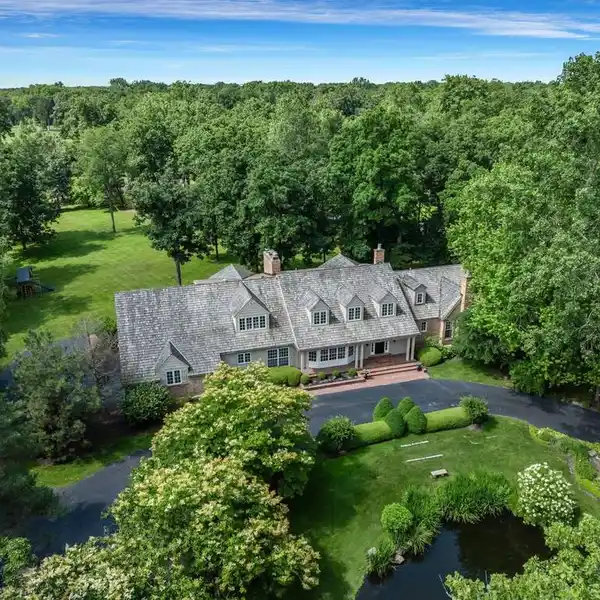 EXCEPTIONAL HOME ON OVER THREE ACRES