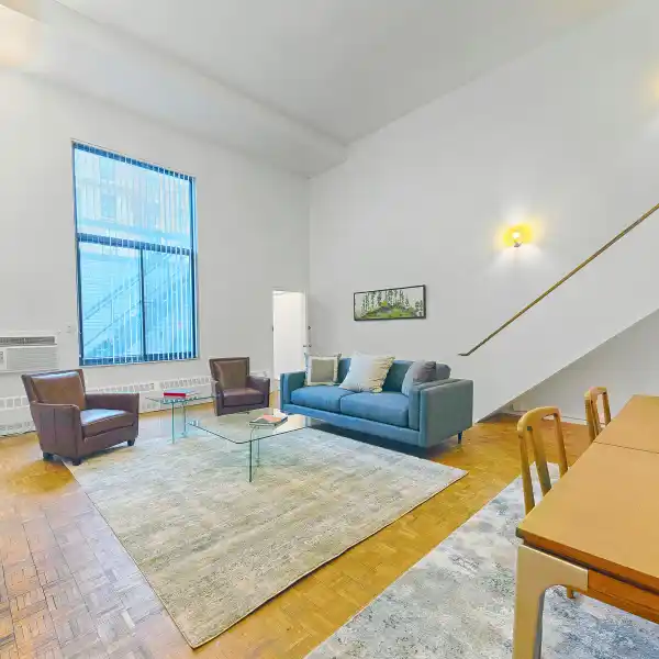 CAVERNOUS TWO BEDROOM CHELSEA TRIPLEX