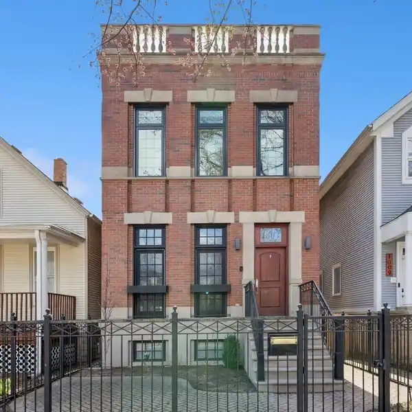 LUXURIOUS BRICK BEAUTY IN SOUTHPORT CORRIDOR