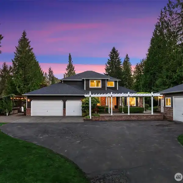 PRIVACY ON OVER TWO ACRES WITH A DETACHED SHOP