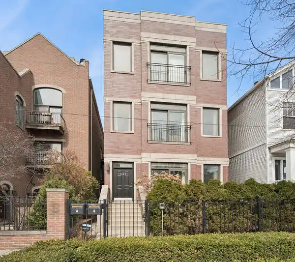 DUPLEX-DOWN IN AN ALL-BRICK TWO-UNIT BUILDING
