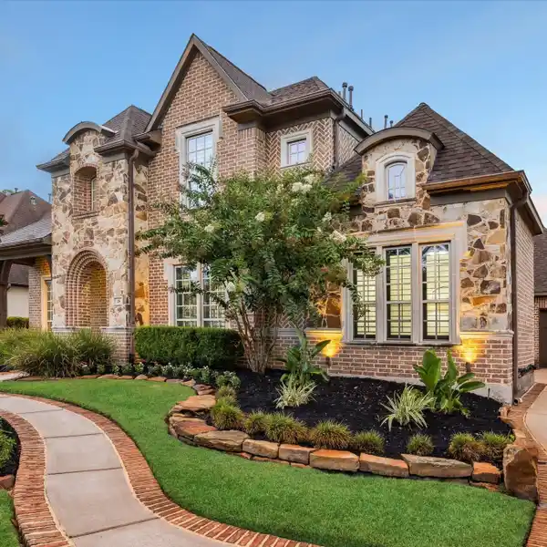 SPACIOUS CREEKSIDE HOME WITH LUXURY UPGRADES