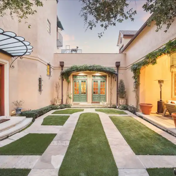 CUSTOM HOME REMINISCENT OF A EUROPEAN VILLA
