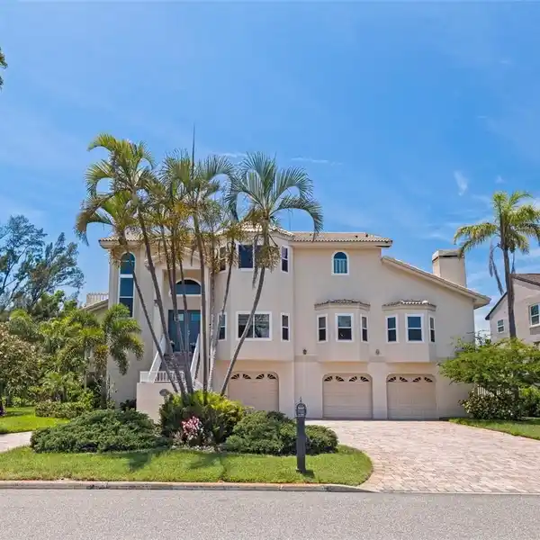 ISLAND LIVING ON AN OVERSIZED CORNER LOT
