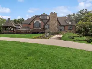 Versatile Estate on Private Acreage with Views
