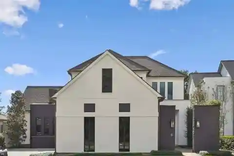 Architectural Serenity with Golf & Water Views