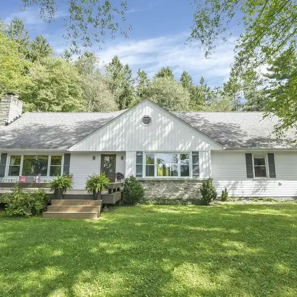 ELEGANT CUSTOM HOME ON 9+ PRIVATE ACRES