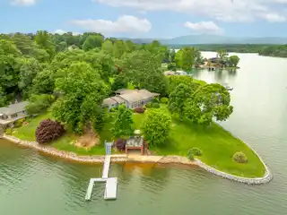 Expansive Lakefront Property with Boat House