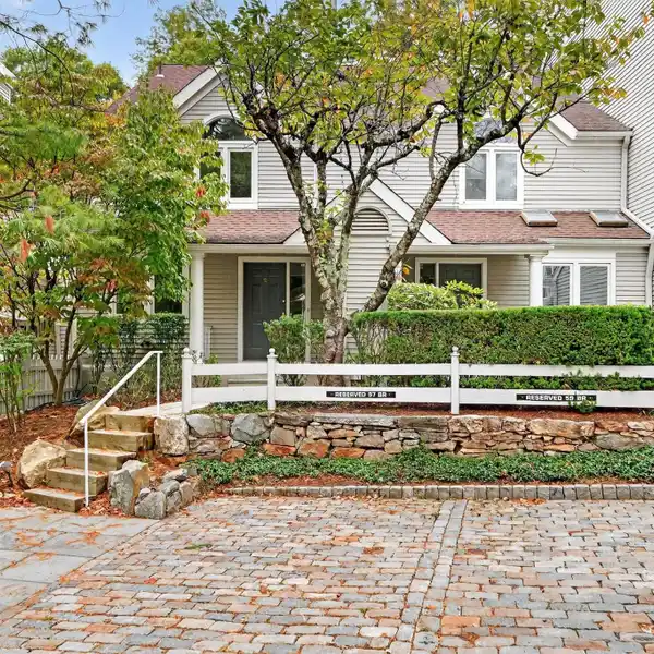 SOPHISTICATED TOWNHOME IN A PREMIER GATED COMMUNITY