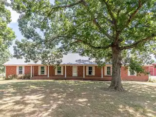 Expansive 25-Acre Homestead with Pool and Orchard