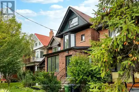 Quintessential Family Home with Backyard and Garage Parking