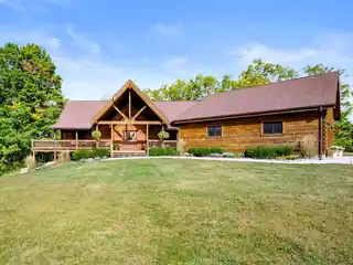 Exceptional Log Cabin on 24 Acres
