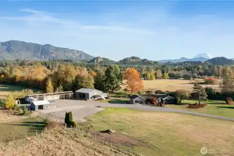 Entertainer’s Paradise with Mt. Rainier Views & Creek Frontage