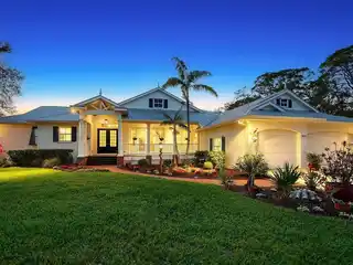 Exquisite Custom-built Coastal Home in a Gated Waterfront Community