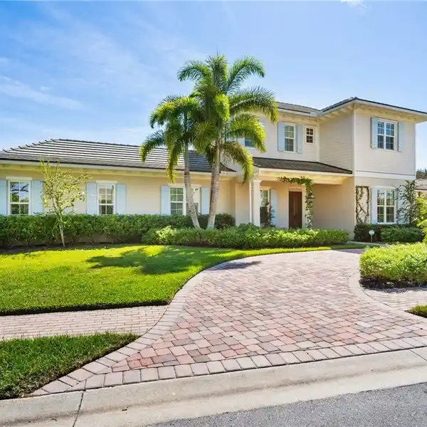 ONE-OF-A-KIND COASTAL RESIDENCE IN PALM ISLAND PLANTATION