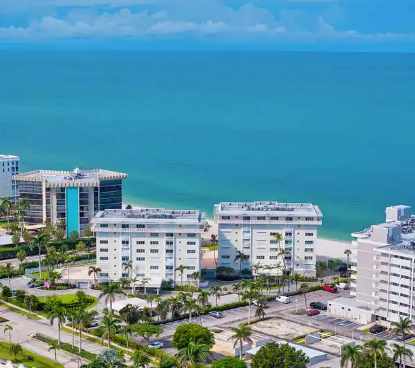 REFINED NAPLES LIFESTYLE ON COVETED GULF SHORELINE