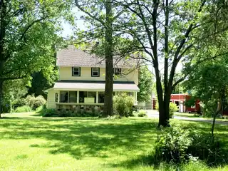 Charming Acreage with Barn and Art Studio
