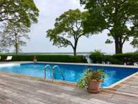 SPRAWLING RANCH WITH PRIVATE BEACH
