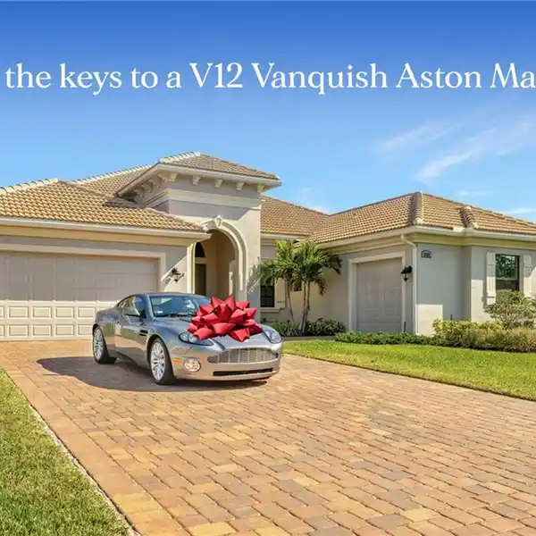 STUNNING HOME PLUS THE KEYS TO AN ASTON MARTIN