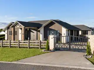 North-Facing Brick Estate with Triple Garage