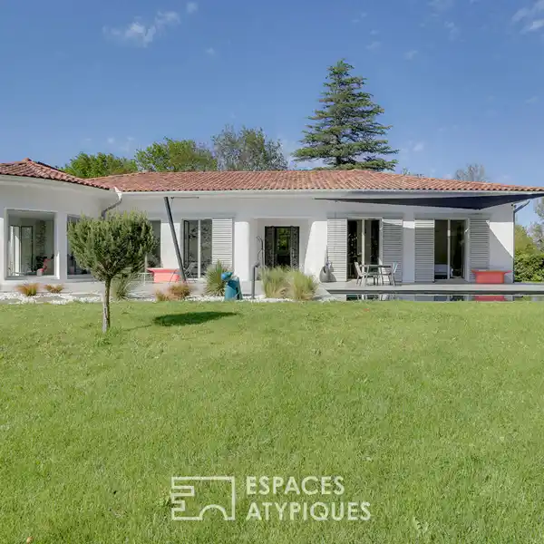 RENOVATED HOME IN A PEACEFUL LANDSCAPED SETTING